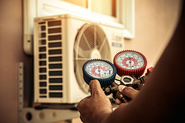 Professional Hvac technician working in Steilacoom, WA